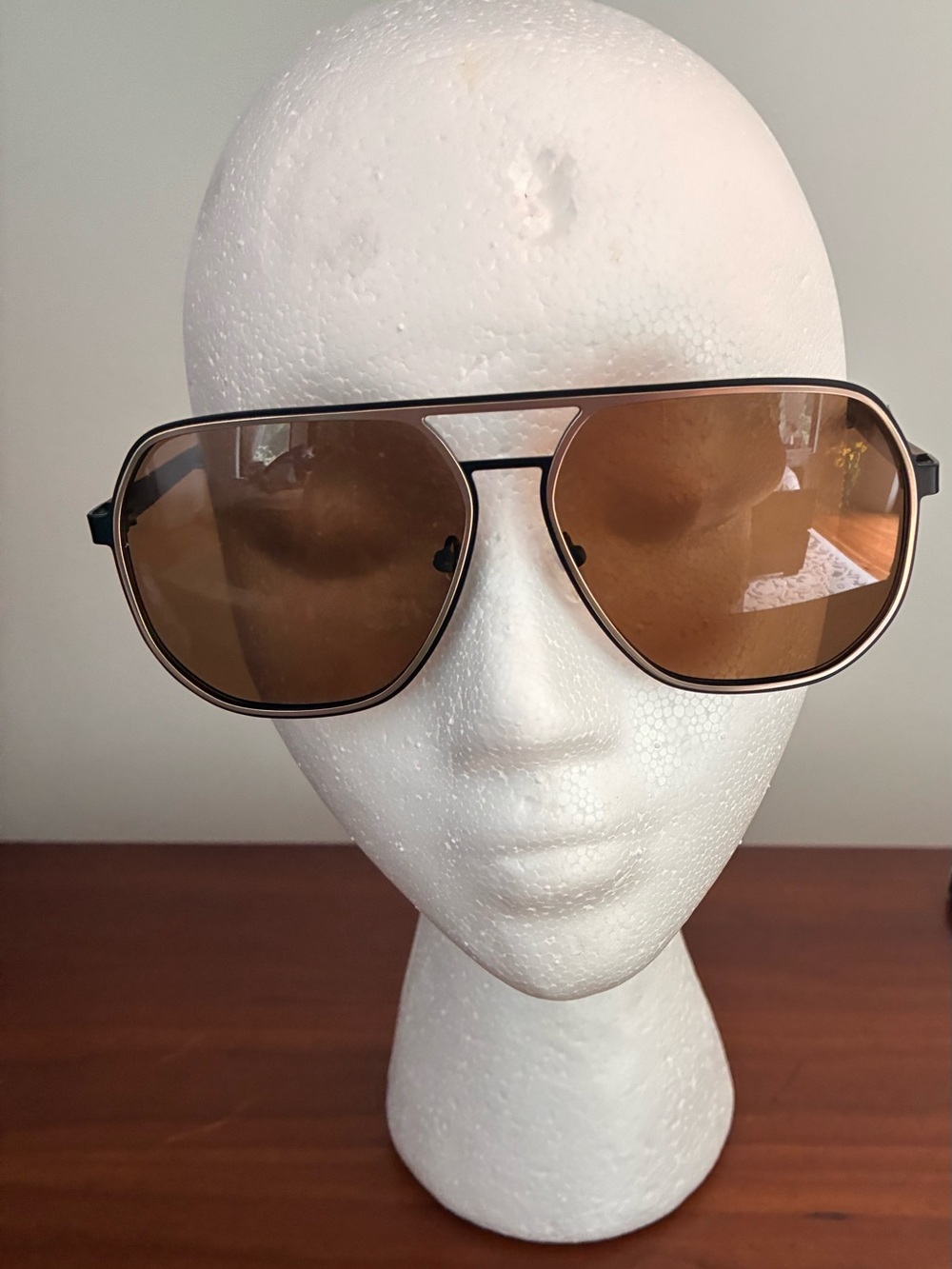 Aviator-Style Sunglasses with Brown Gradient Lenses.